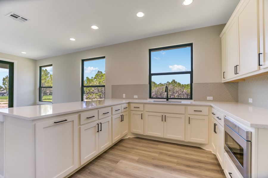 Representative furnished interior of a home built from the Casita by Giddens Homes in Burnet Hilltop Estates, Cedar Park (Image 54).