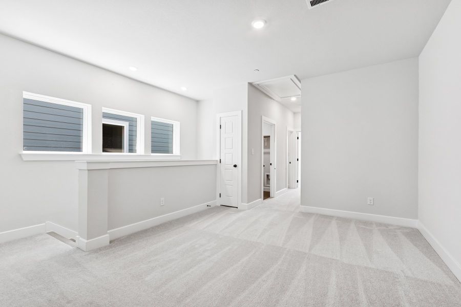 Spacious, unfurnished interior of a new home in Double Creek Crossing – City Home Series, Round Rock (Image 11). Spacious, unfurnished interior of a new home in Double Creek Crossing – City Home Series, Round Rock (Image 11).