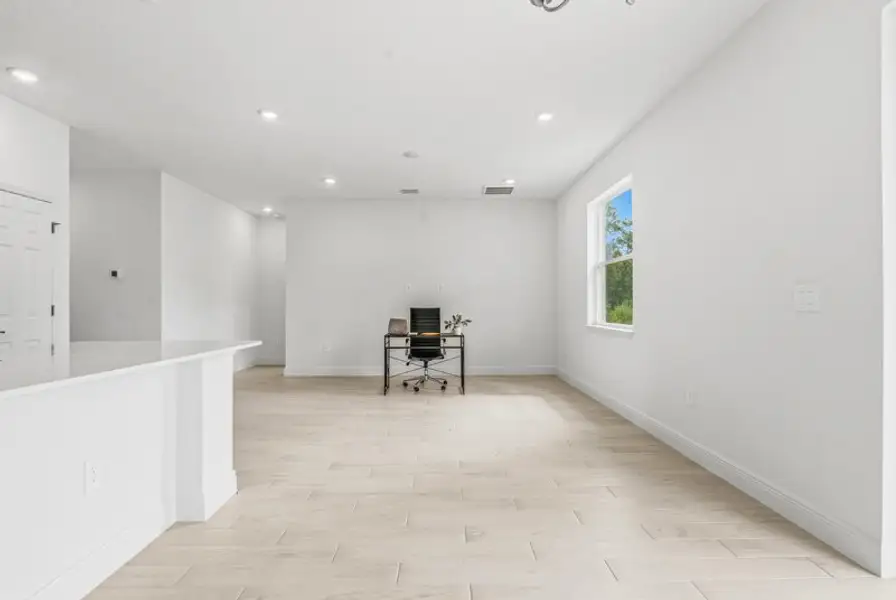 Spacious, unfurnished interior of a new home in Huntington Park, Titusville (Image 17). Spacious, unfurnished interior of a new home in Huntington Park, Titusville (Image 17).