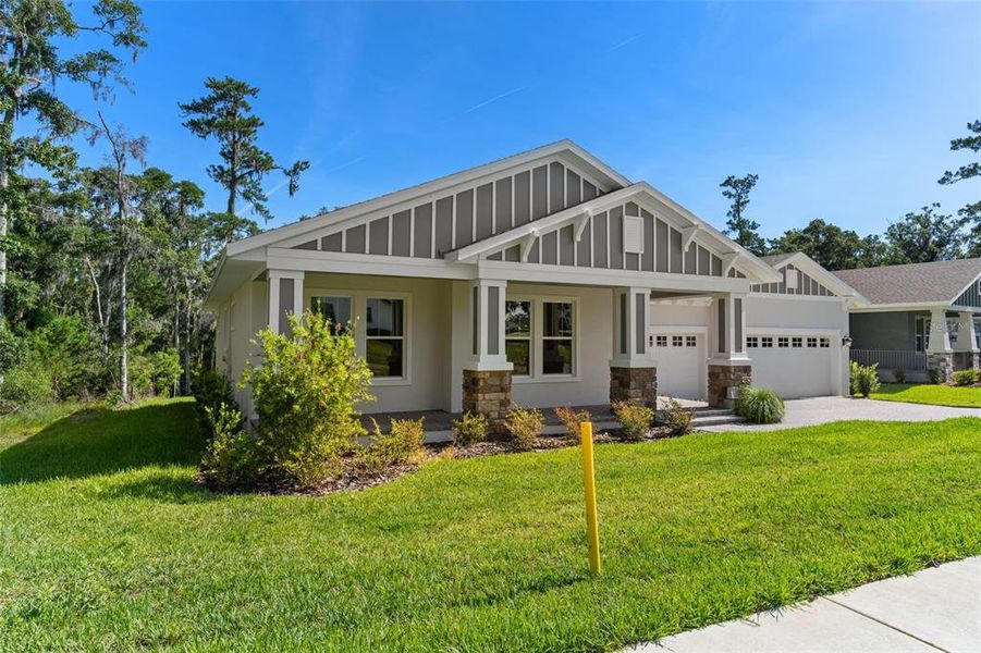 Front exterior of a new home in Southern Hills Plantation, Brooksville, FL, highlighting curb appeal (Image 19).