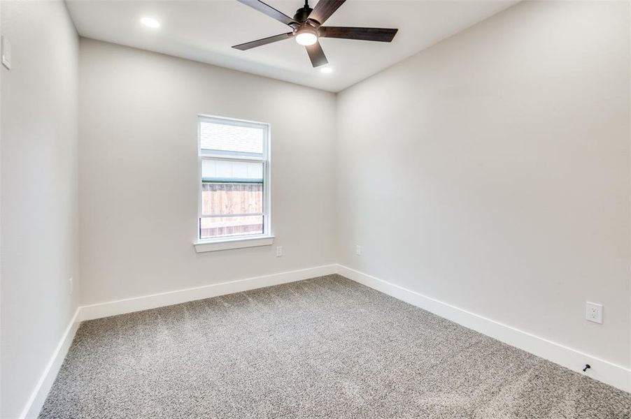 bedroom with carpet flooring and ceiling fan