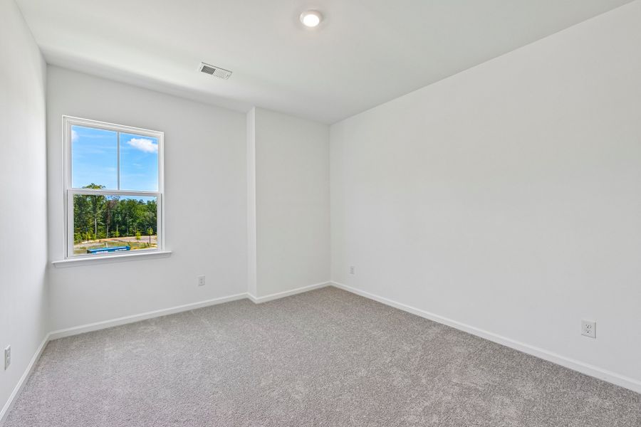Spacious, unfurnished interior of a new home in Terraces at the Exchange, Fort Mill (Image 21).