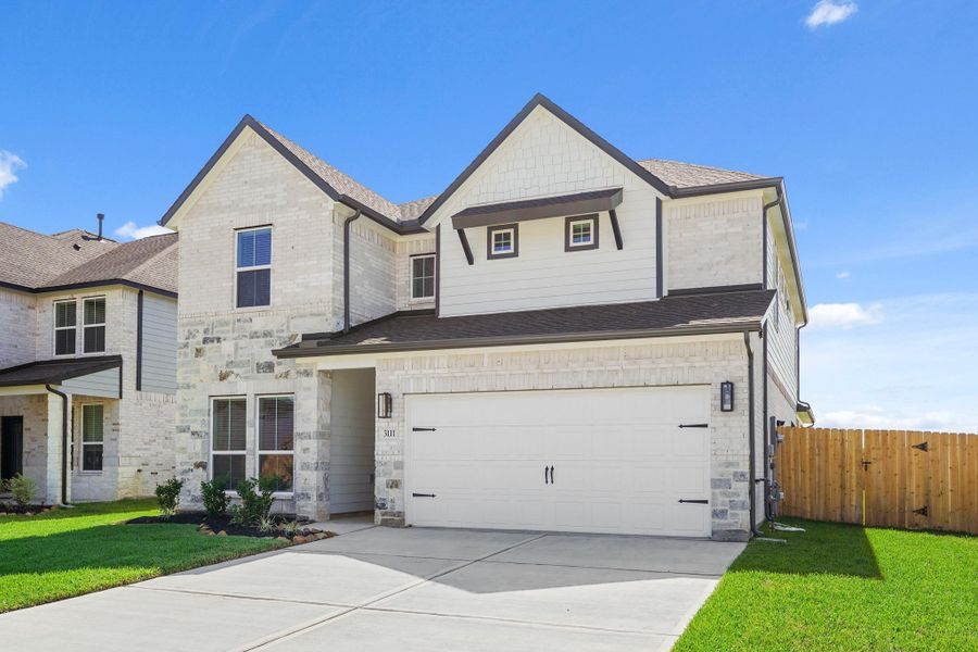 Front exterior of a new home in Briarwood Crossing, Rosenberg, TX, highlighting curb appeal (Image 2). Front exterior of a new home in Briarwood Crossing, Rosenberg, TX, highlighting curb appeal (Image 2).