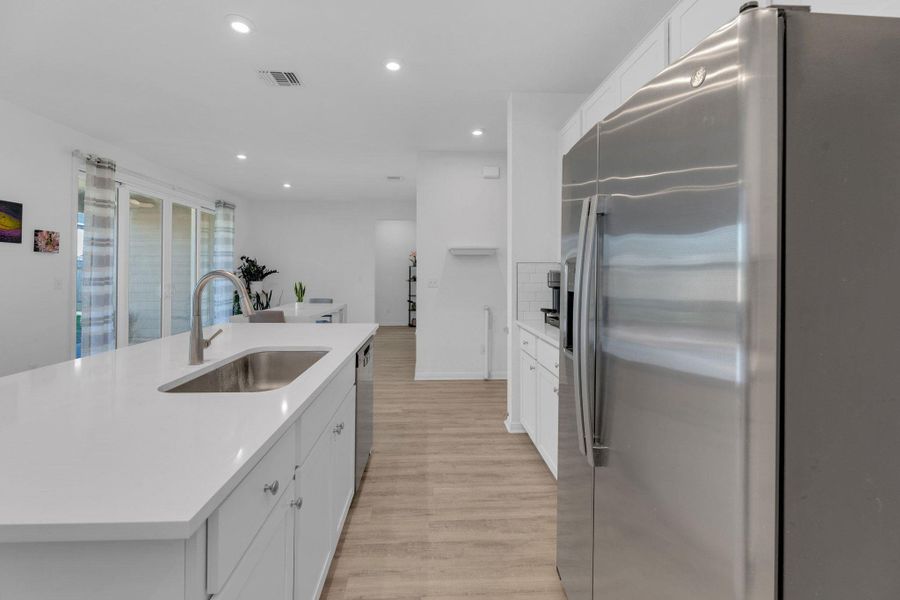 Furnished interior view inside a new home in Seasons at Carillon, Manor (Image 29).