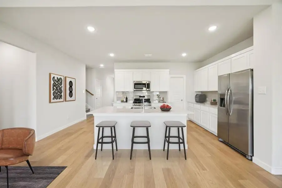 Kitchen in the Masters home plan by Trophy Signature Homes – REPRESENTATIVE PHOTO Kitchen in the Masters home plan by Trophy Signature Homes – REPRESENTATIVE PHOTO