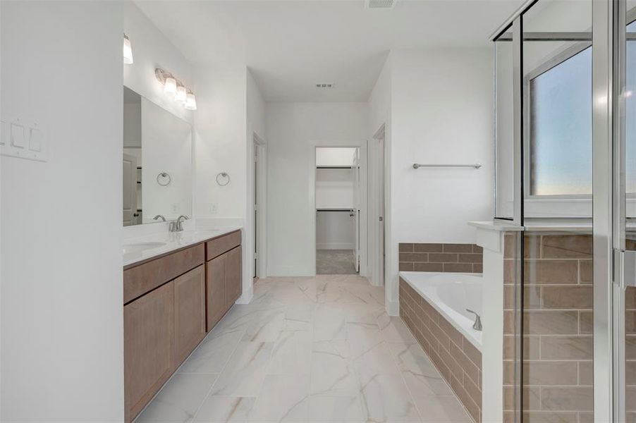 Furnished interior view inside a new home in Lily Creek at Sutton Fields, Aubrey (Image 13).