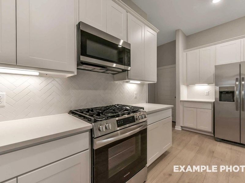 Furnished interior view inside a new home in Enclave at Newport, Crosby (Image 7).