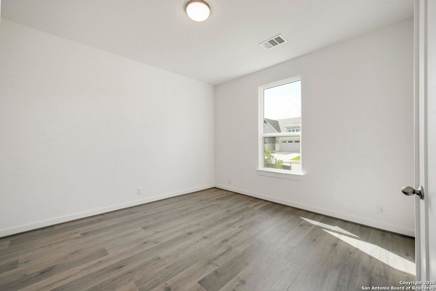 Spacious, unfurnished interior of a new home in The Crossvine, Schertz (Image 13).