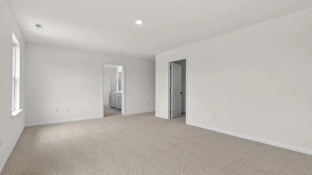 Spacious, unfurnished interior of a new home in The Landing at Winston Pointe, Clayton (Image 27).