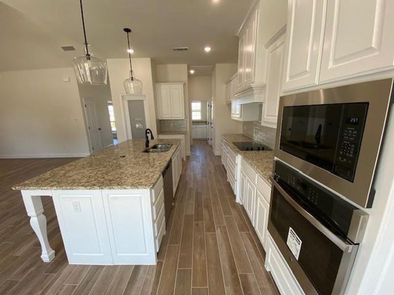 Furnished interior view inside a new home in , Azle (Image 6).