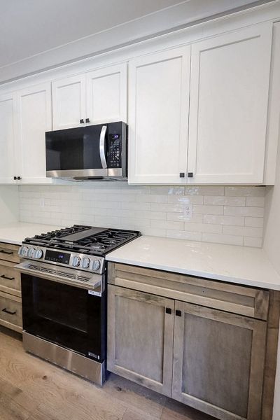 Furnished interior view inside a new home in Baker Road, Birchwood (Image 14).