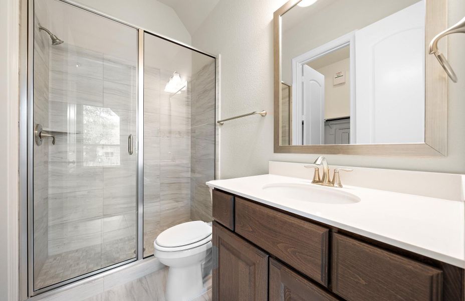 Furnished interior view inside a new home in The Woodlands Hills 65′, Willis (Image 20).