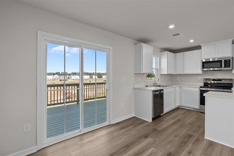 Furnished interior view inside a new home in South Mills Towns, South Mills (Image 6).