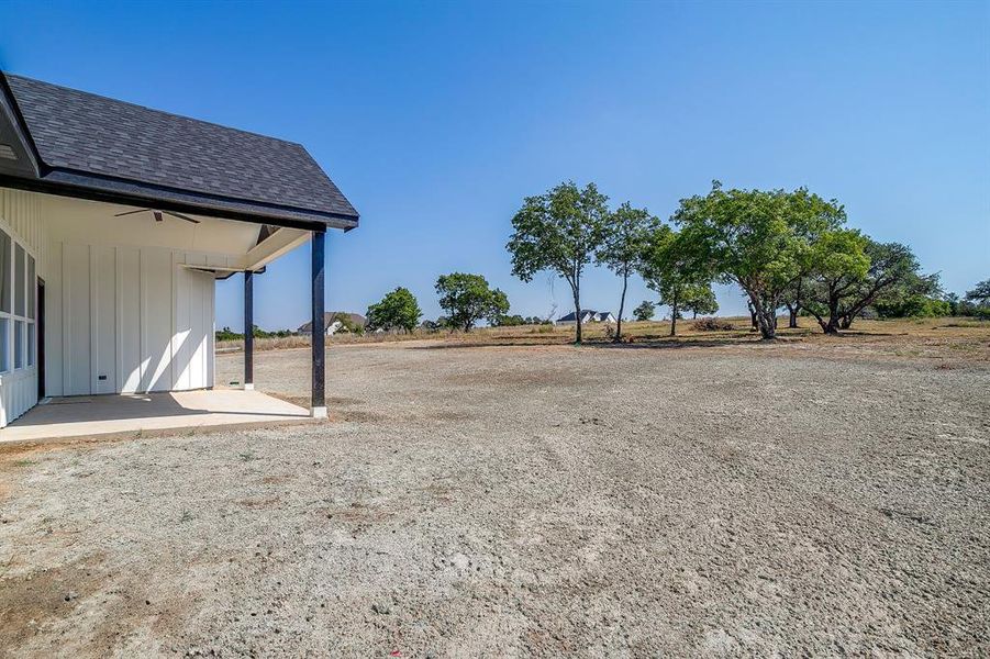 Front exterior of a new home in , Weatherford, TX, highlighting curb appeal (Image 21).