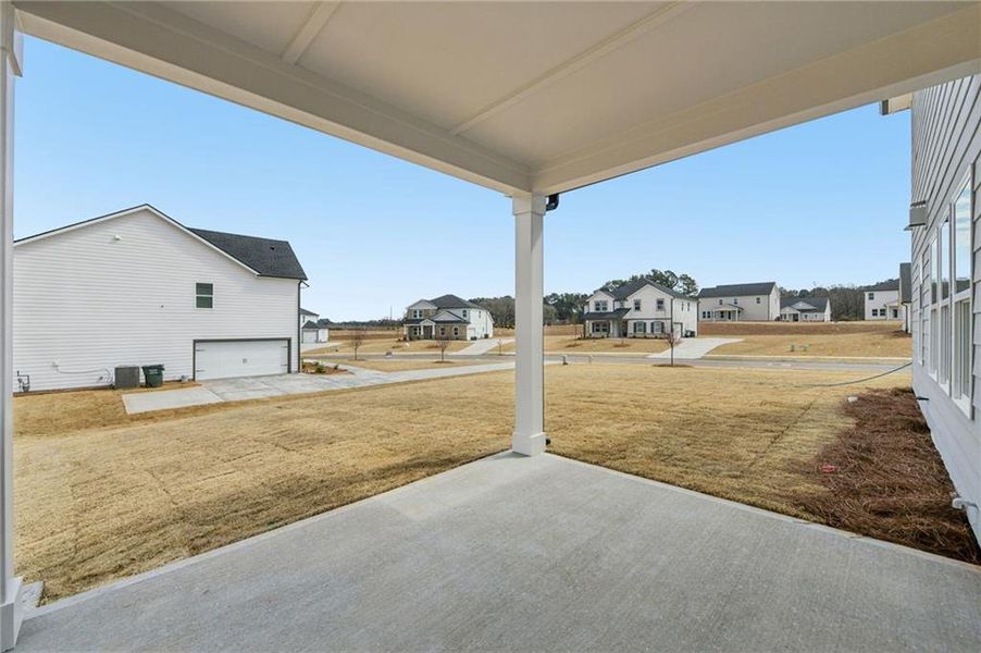 Exterior details and patio area of a home in River Pointe, Monroe (Image 29).