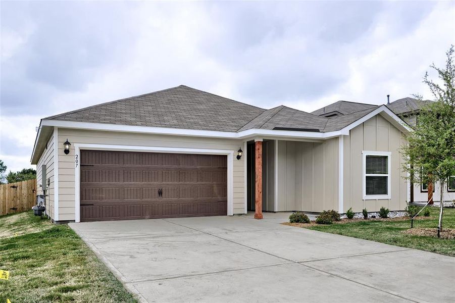 Front exterior of a new home in Creekside Estates, Terrell, TX, highlighting curb appeal (Image 2). Front exterior of a new home in Creekside Estates, Terrell, TX, highlighting curb appeal (Image 2).