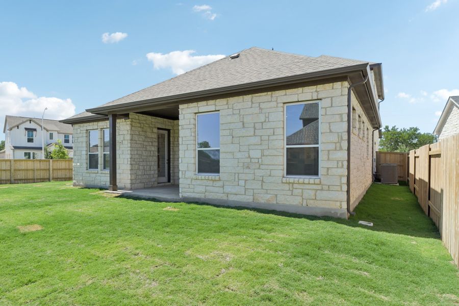 Exterior details and patio area of a home in Persimmon, Buda (Image 16).