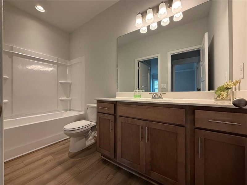 Furnished interior view inside a new home in Ponderosa Farms Manor, Gainesville (Image 8).