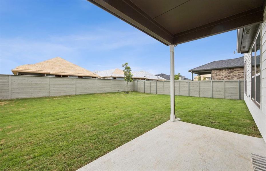 Oversized yard with covered patio *Real home pictured Oversized yard with covered patio *Real home pictured