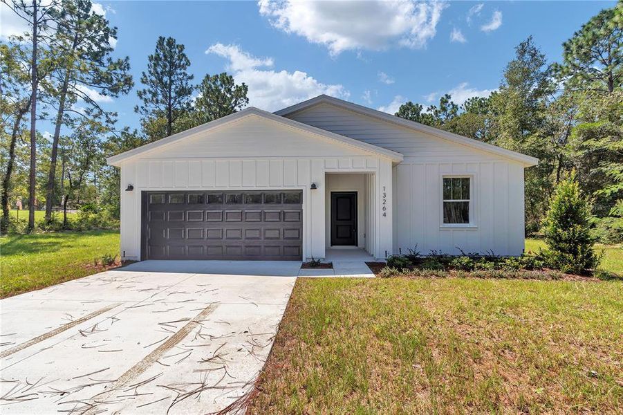 Front exterior of a new home in , Ocala, FL, highlighting curb appeal (Image 31).