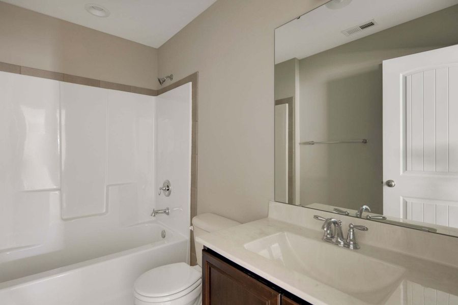 Representative furnished interior of a home built from the Clayton by Caviness & Cates Communities in Bartlett Manor, Youngsville (Image 224).