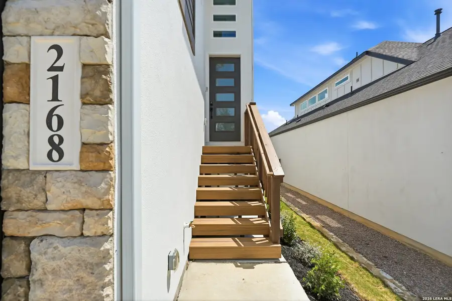 Exterior details and patio area of a home in Prominence Urban, San Antonio (Image 4).
