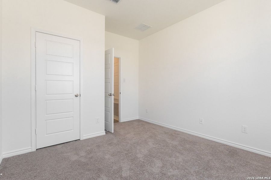 Spacious, unfurnished interior of a new home in Hidden Bluffs at TRP, San Antonio (Image 7).