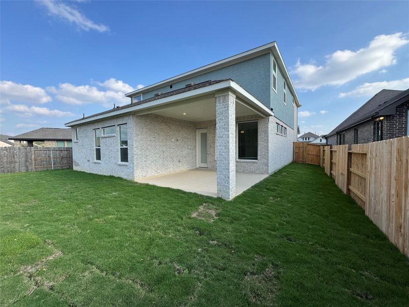 Exterior details and patio area of a home in The Trails, New Caney (Image 2).