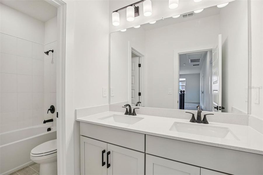 Furnished interior view inside a new home in Magnolia Bay - Reserve Series, Nokomis (Image 15).