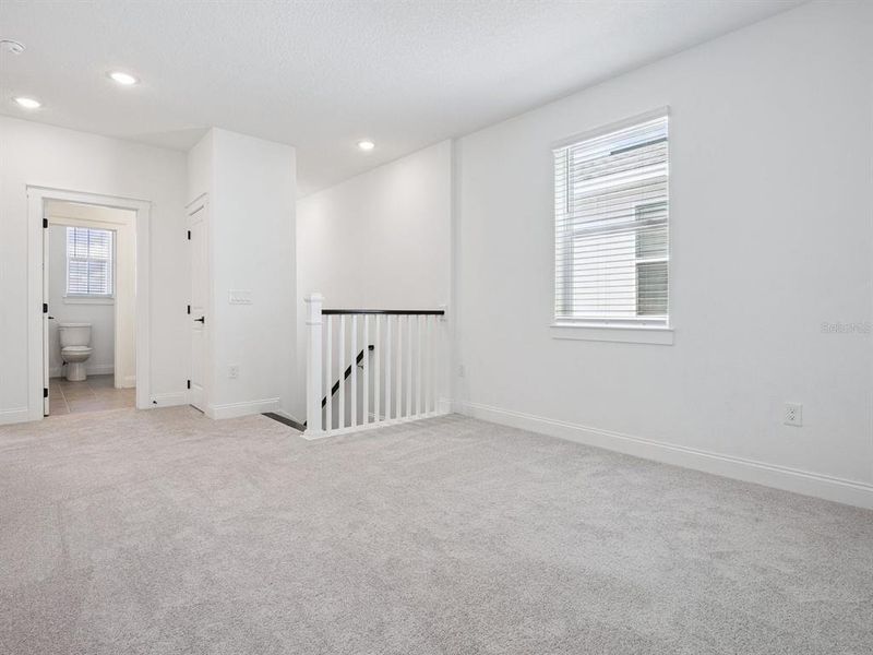 Spacious, unfurnished interior of a new home in Osprey Ranch, Winter Garden (Image 32).
