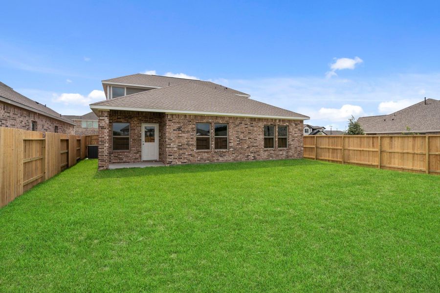 Exterior details and patio area of a home in Windrose Green, Angleton (Image 23). Exterior details and patio area of a home in Windrose Green, Angleton (Image 23).