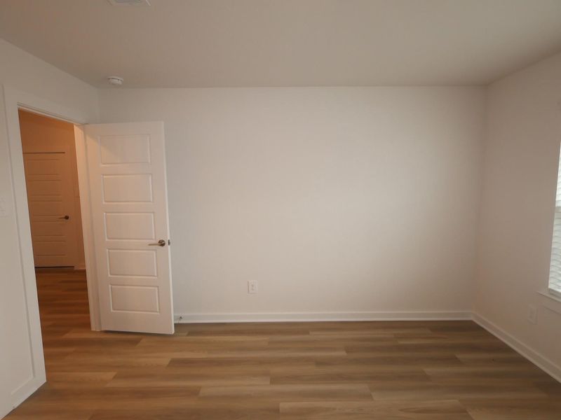 Spacious, unfurnished interior of a new home in Pinewood at Grand Texas, New Caney (Image 15).