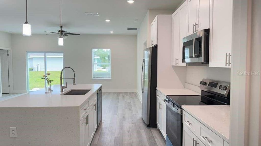 Furnished interior view inside a new home in , Ocala (Image 9).