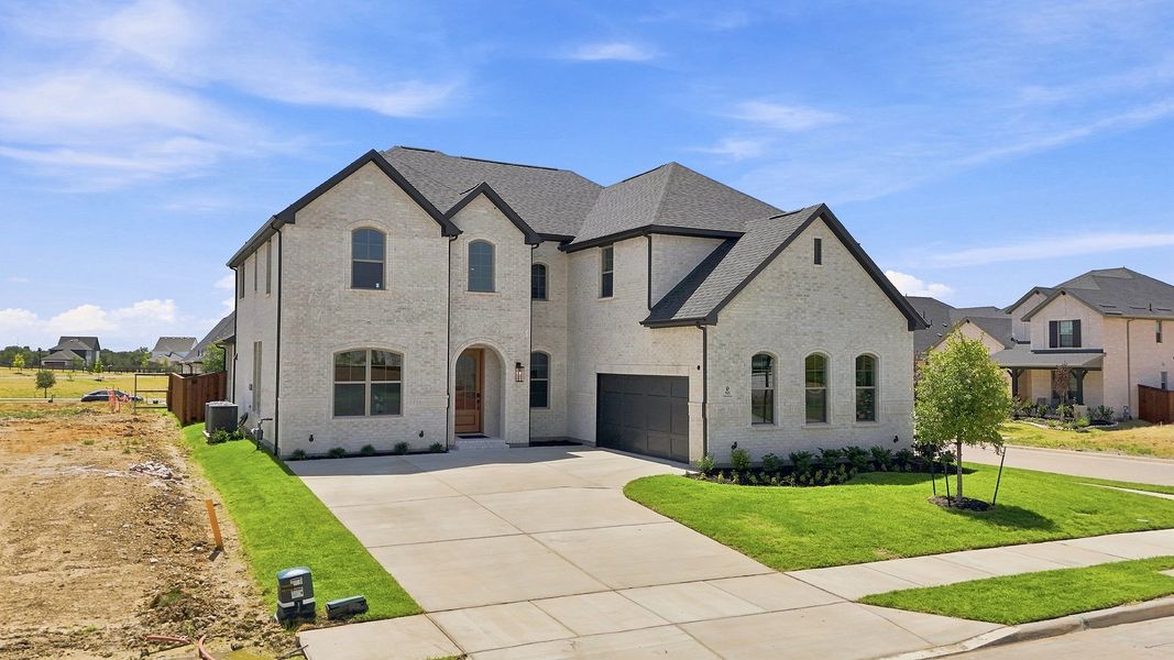 Front exterior of a new home in Hillside Village, Celina, TX, highlighting curb appeal (Image 23).
