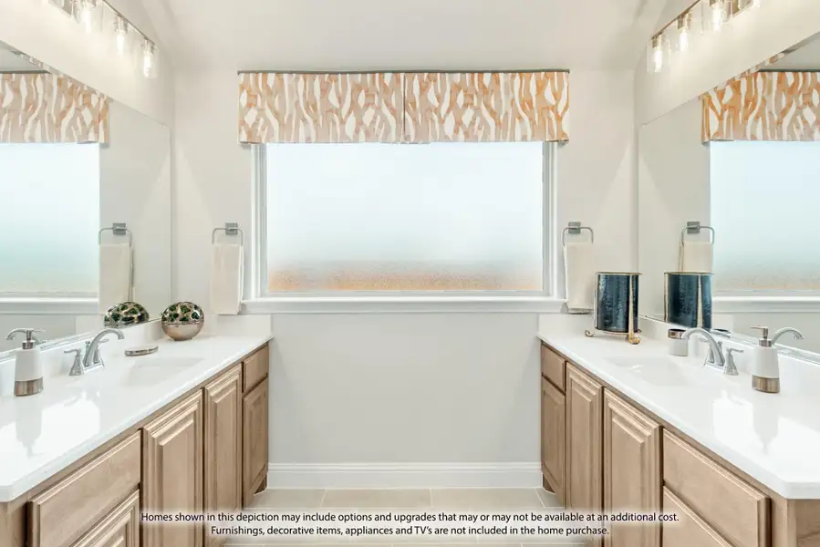 Dual vanity bathroom with wood cabinets, white countertops, and frosted privacy windows between two sinks Dual vanity bathroom with wood cabinets, white countertops, and frosted privacy windows between two sinks