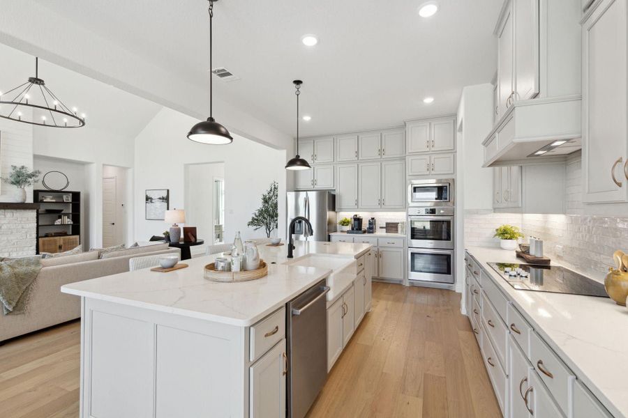 Kitchen | Concept 3441 at Hidden Creek Estates in Van Alstyne, TX by Landsea Homes