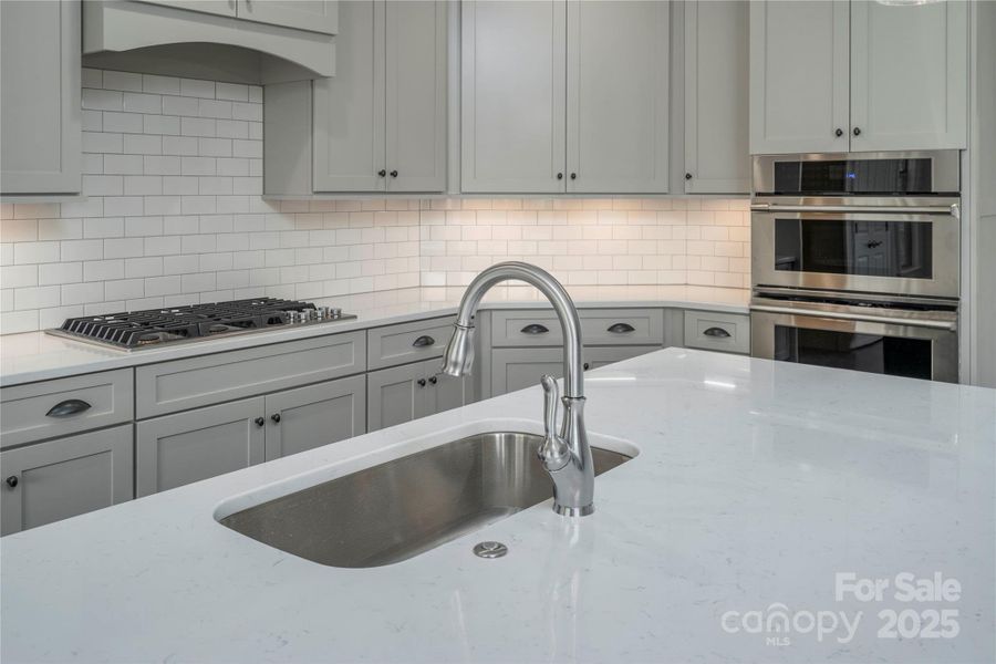 Please Note Photos are of completed home with similar finishes.   Plan to be reversed on this homesite