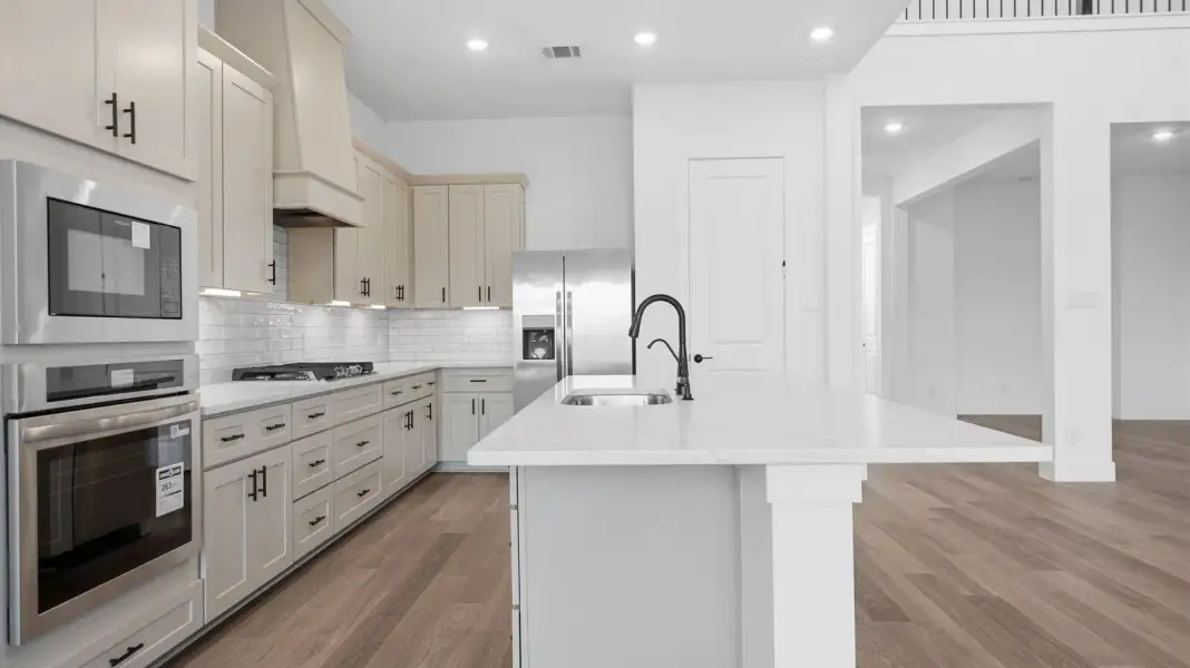 Representative furnished interior of a home built from the Adrian by D.R. Horton in Alexander 65' Homesites, Pearland (Image 6).
