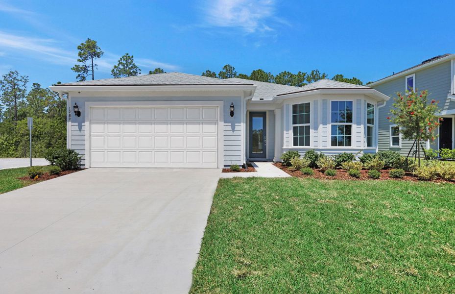 Representative exterior photo of a completed home built from the Mystique by Pulte Homes in Seminole Palms, Palm Coast, FL (Image 20). Representative exterior photo of a completed home built from the Mystique by Pulte Homes in Seminole Palms, Palm Coast, FL (Image 20).