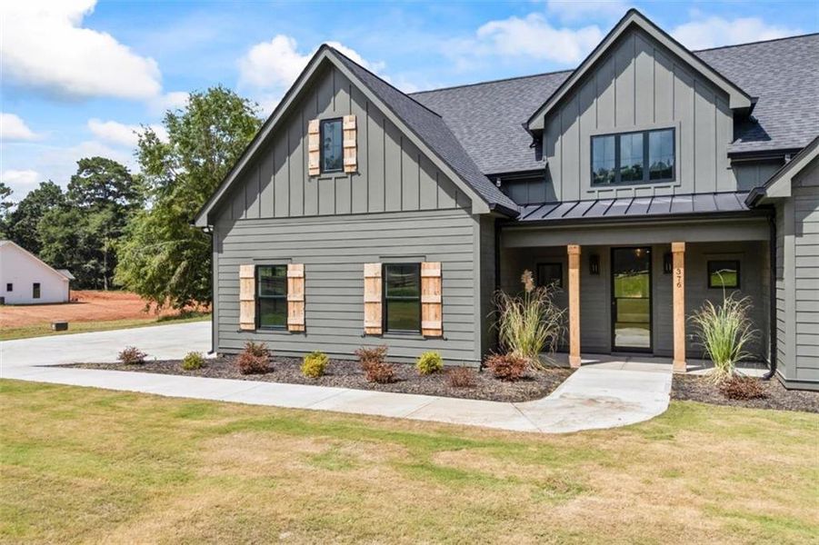 Exterior details and patio area of a home in , Monroe (Image 36).