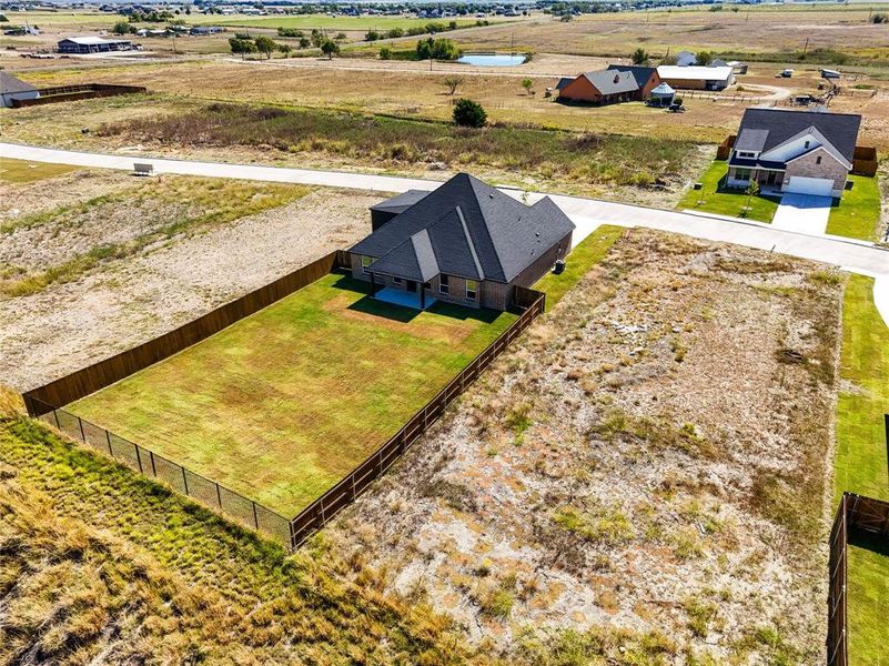 Front exterior of a new home in , Venus, TX, highlighting curb appeal (Image 22).