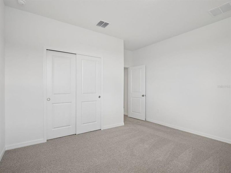 Spacious, unfurnished interior of a new home in Coasterra - Reserve Series, Palmetto (Image 23).