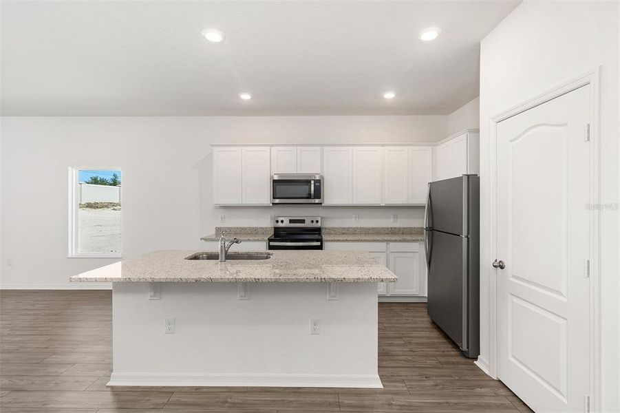 Furnished interior view inside a new home in Peach Crossings, Winter Haven (Image 4).