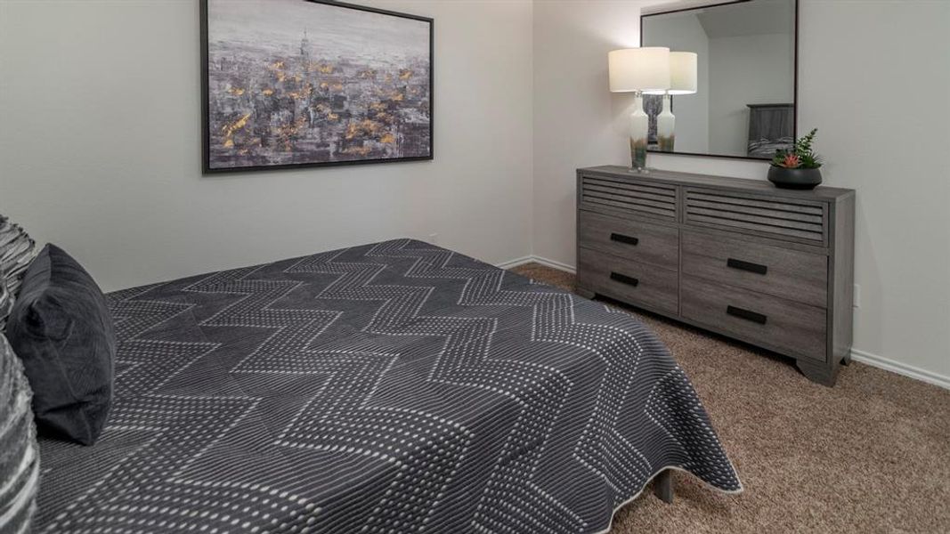 Bedroom with dark carpet