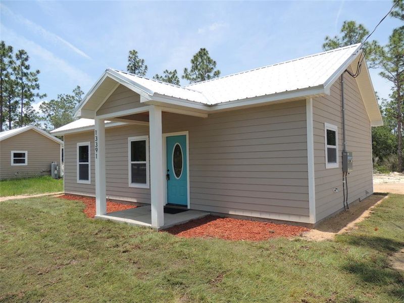 Front exterior of a new home in , Williston, FL, highlighting curb appeal (Image 11). Front exterior of a new home in , Williston, FL, highlighting curb appeal (Image 11).