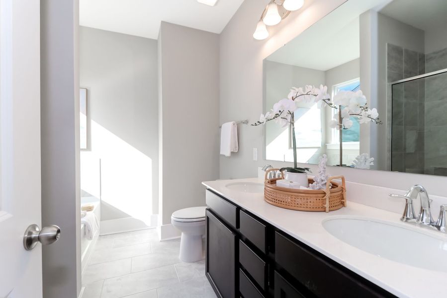 Representative furnished interior of a home built from the Inverness P by True Homes in Homecoming, Ravenel (Image 15).