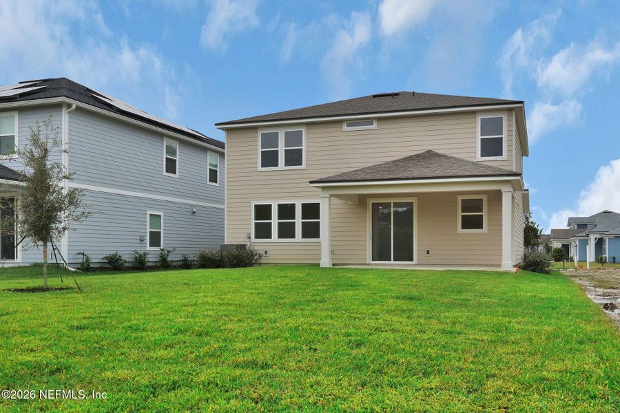 Exterior details and patio area of a home in Hyland Trail, Green Cove Springs (Image 31).