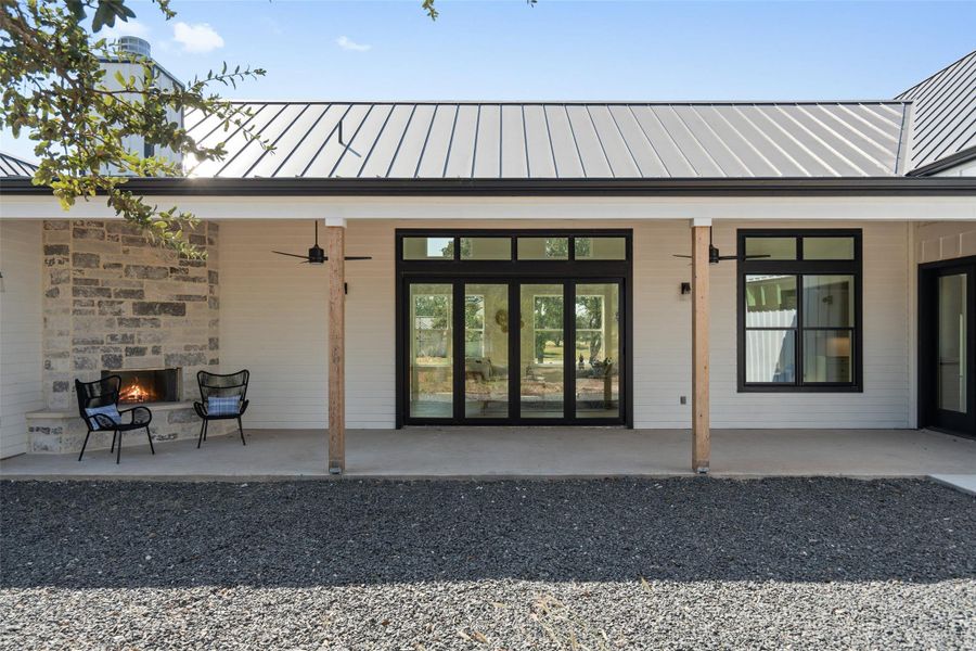 Private backyard retreat with a covered patio and tranquil greenbelt views.