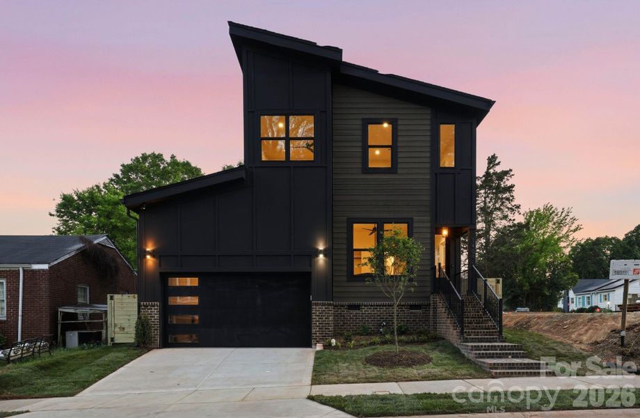 Front exterior of a new home in , Charlotte, NC, highlighting curb appeal (Image 2).