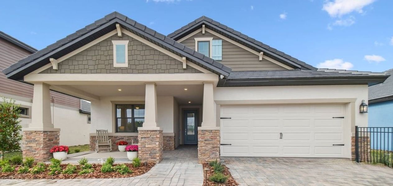 Representative exterior photo of a completed home built from the Sweetwater by William Ryan Homes in Southern Hills Plantation, Brooksville, FL (Image 28).